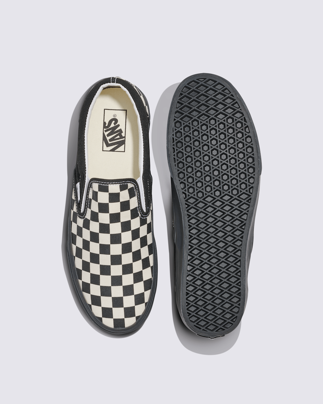 Classic Slip-On Checkerboard Shoe in Checkerboard White / Black | Vans outlet